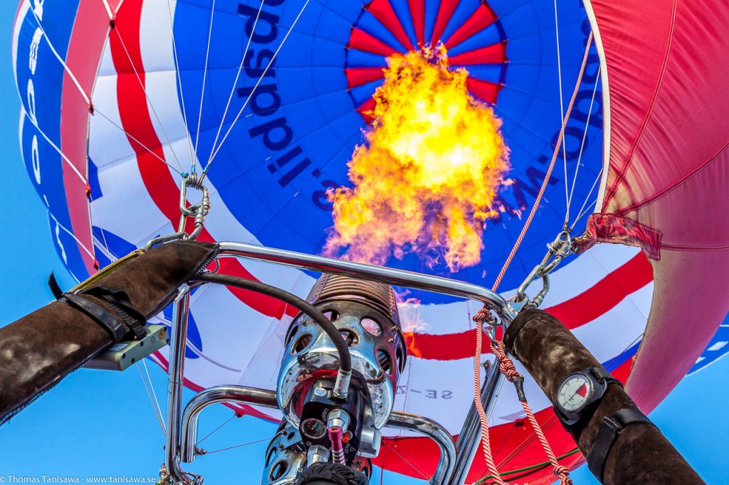 burning hot air into the balloon